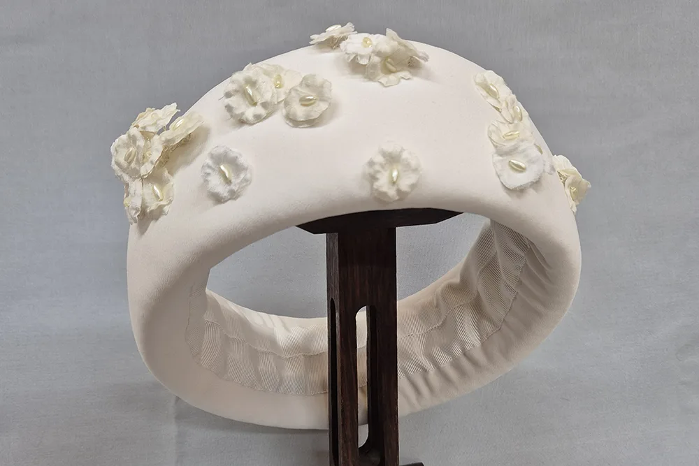 beaded bridal head ring on stand.