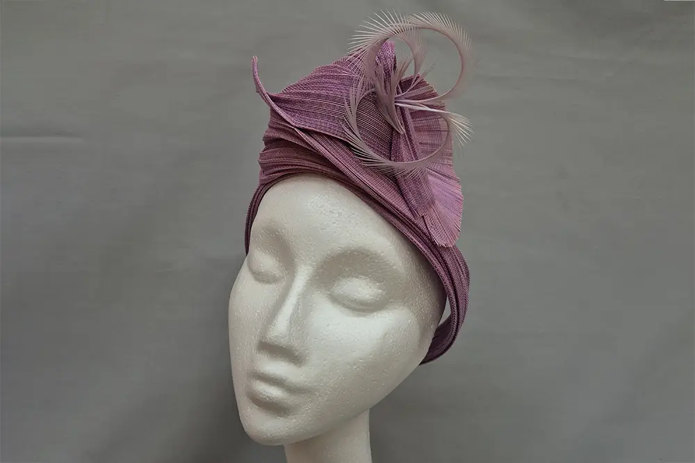 Lilac Jinsin Turban on a mannequin head.